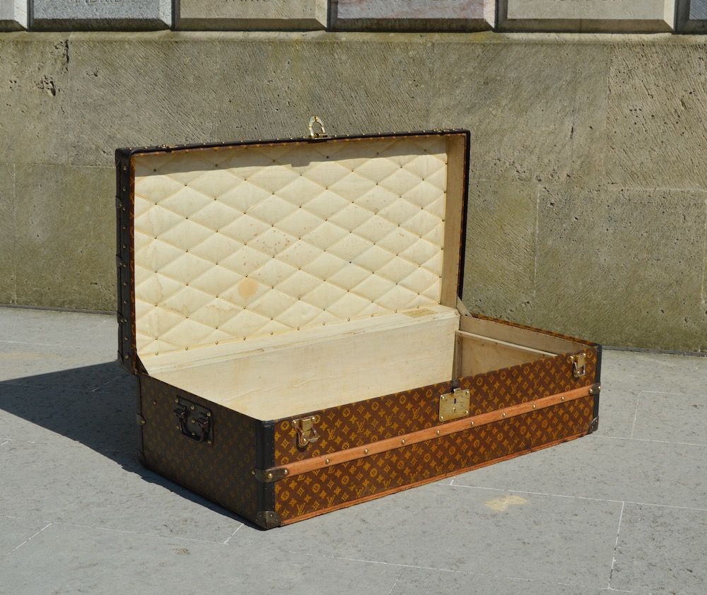 This Louis Vuitton cabin trunk with stenciled monogrammed canvas is ideal  for a coffee table