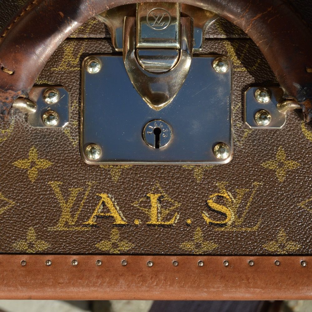 Lot - LOUIS VUITTON Alzer suitcase in monogram canvas and brown lozine